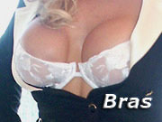 picture of a woman's bra showing down her blouse