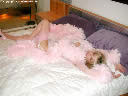 pink feathered robe pink stockings see-through panties