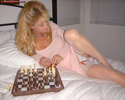 Upskirt and Downblouse views of sonia's panties and breasts as she's playing chess